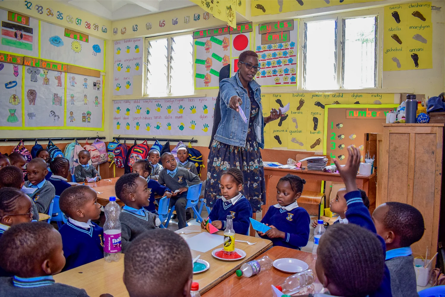 A Kindergarten teacher leading a hands-on lesson at St. Christopher's